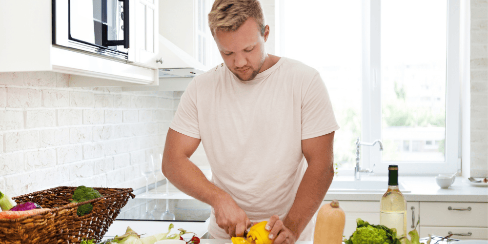 man preparing healthy food