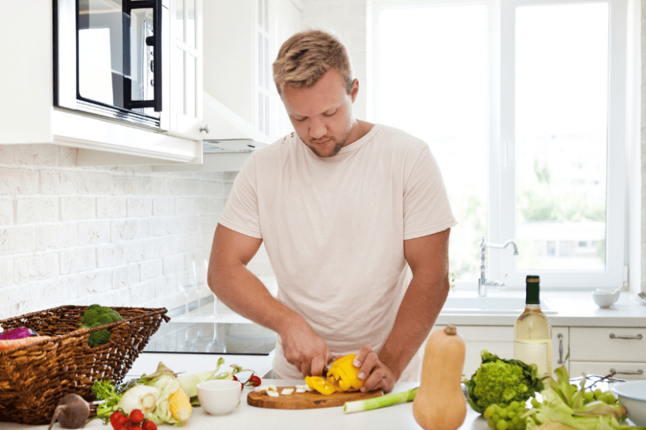 email header img (9) man preparing healthy food