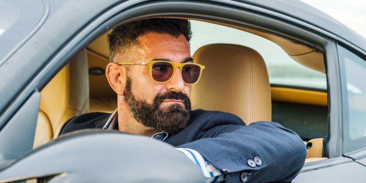 The Hormone Behind High Performers Is It Fueling Your Career or Holding You Back successful man in car
